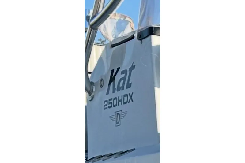 Slide: The Image of Close-up of 2022 Dargel KAT 250DLX boat with visible branding. - 8
