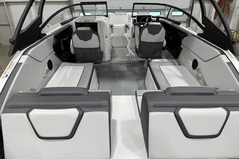 Slide: The Image of 2025 Yamaha Boats AR250 interior with sleek seating and modern design. - 9