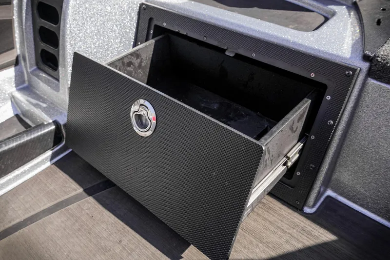 Slide: The Image of Open storage drawer on 2024 Triton 20XP boat, featuring sleek design and durable materials. - 15