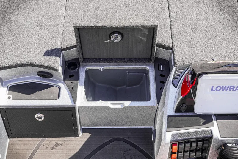 Slide: The Image of 2024 Triton 20XP boat interior with storage compartments and Lowrance equipment. - 22