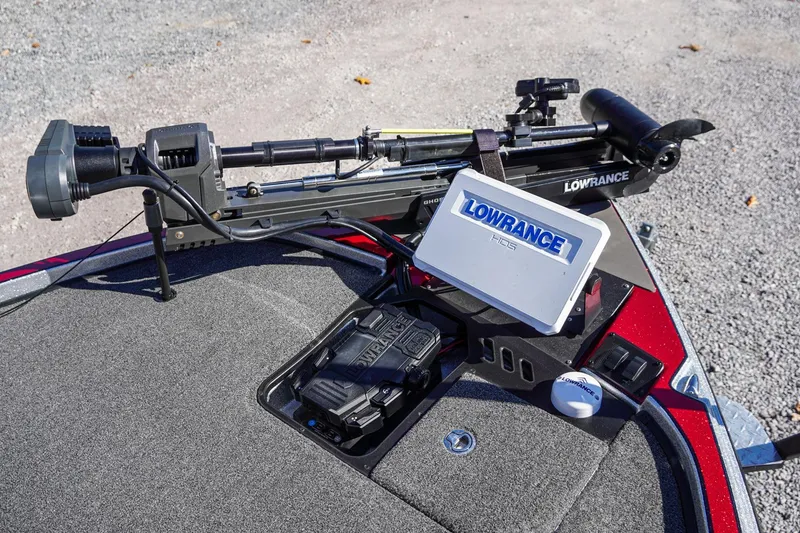 Slide: The Image of 2024 Triton 20XP boat with Lowrance HDS system and trolling motor on deck. - 9