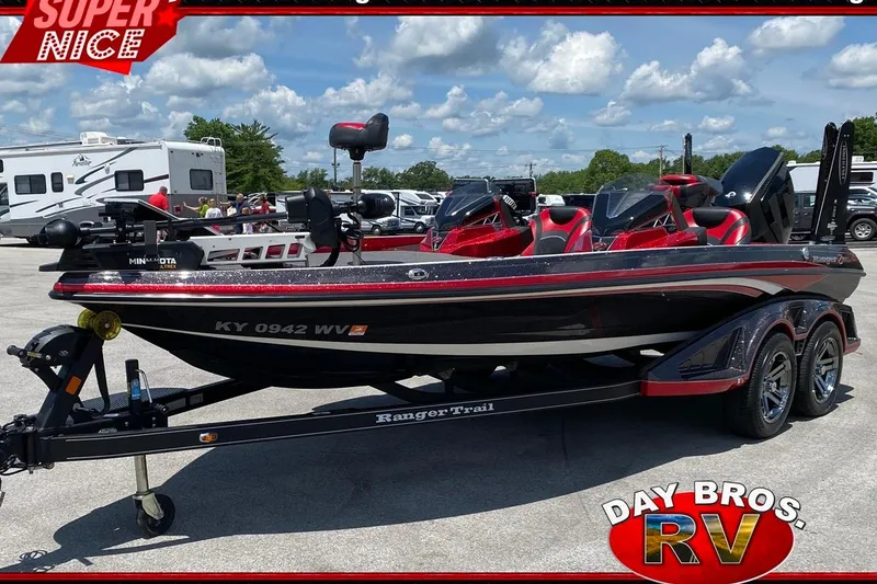 The Image of 2020 Ranger Z520L boat with red accents on a trailer at Day Bros RV dealership. - 1