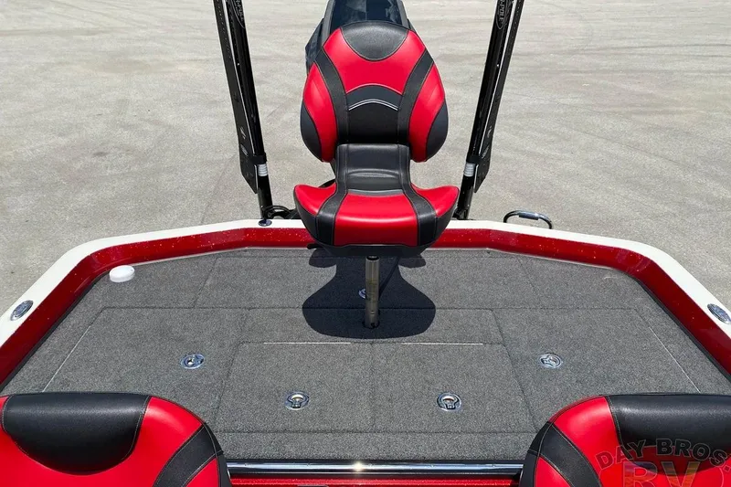 Slide: The Image of 2020 Ranger Z520L boat deck with red and black seating, featuring a sleek design. - 103