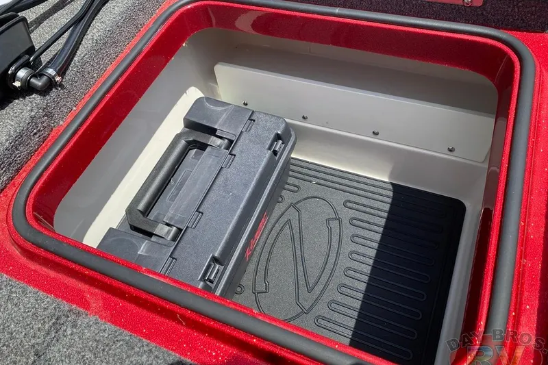 Slide: The Image of Storage compartment of a 2020 Ranger Z520L boat with a black toolbox inside. - 115