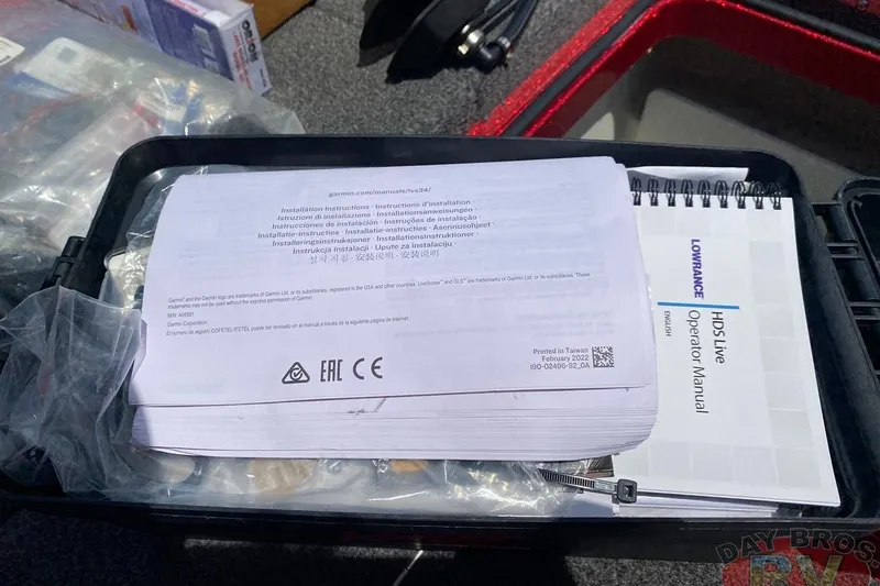 Slide: The Image of Manuals and documents in a Ranger Z520L boat storage compartment, 2020 model. - 116