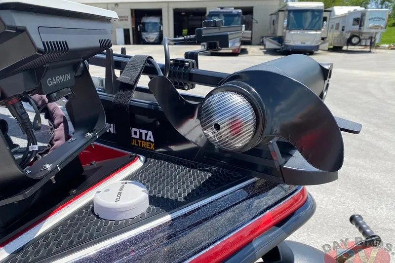 Slide: The Image of 2020 Ranger Z520L boat with Garmin and Minn Kota Ultrex equipment, parked near RVs. - 15