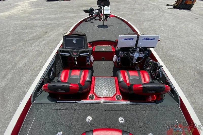 Slide: The Image of 2020 Ranger Z520L boat interior with dual Lowrance displays and red-black seating. - 20