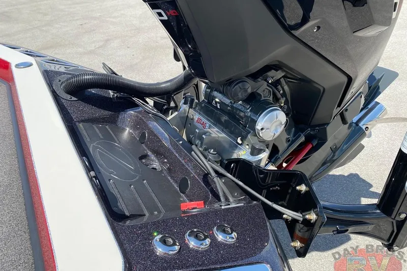 Slide: The Image of 2020 Ranger Z520L boat engine and control panel close-up. - 37