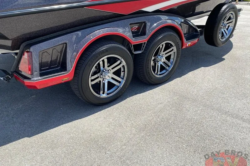 Slide: The Image of 2020 Ranger Z520L boat trailer with dual chrome wheels and red accents. - 48