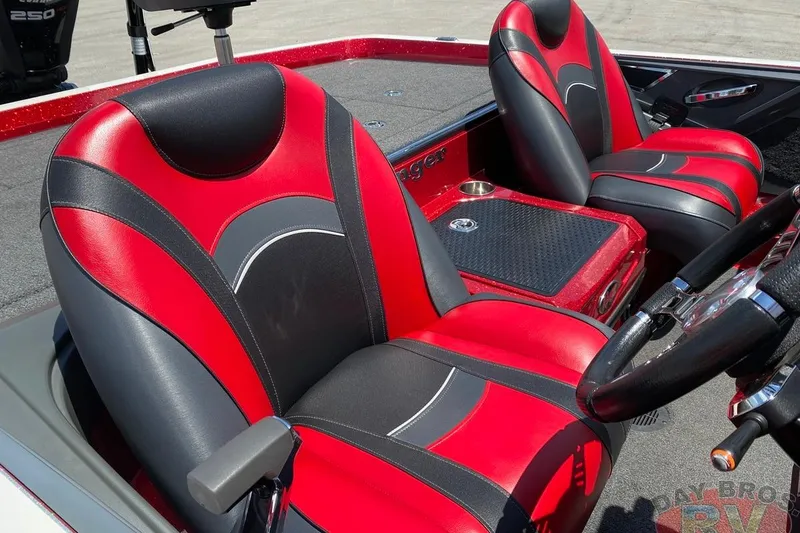 Slide: The Image of 2020 Ranger Z520L boat interior with red and black seats, steering wheel, and console. - 53