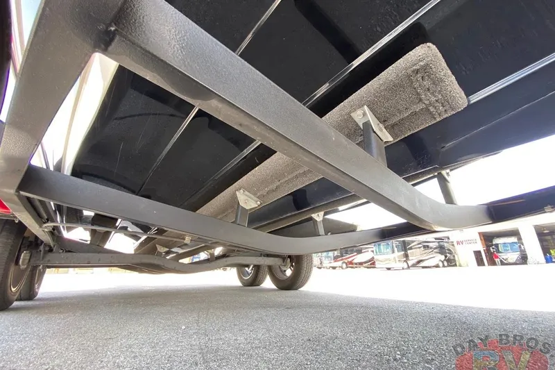 Slide: The Image of Underside view of a 2020 Ranger Z520L boat trailer in a showroom. - 63