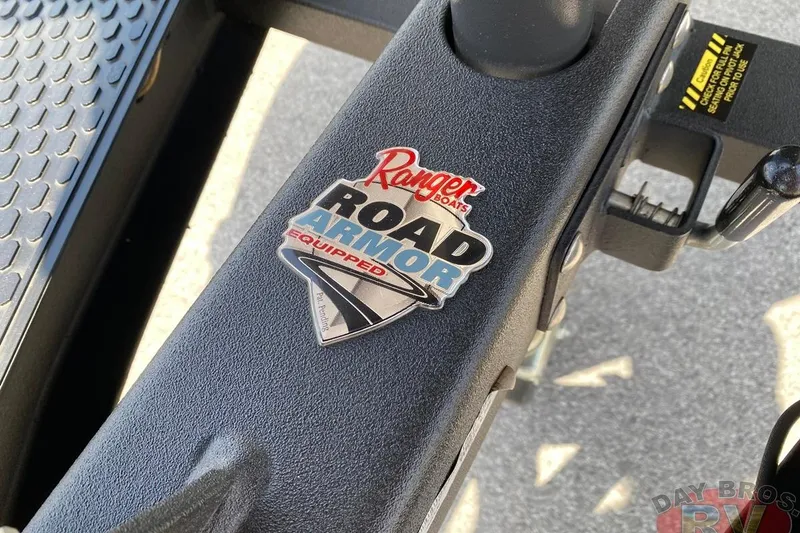 Slide: The Image of 2020 Ranger Z520L with Road Armor Equipped badge on black surface. - 65