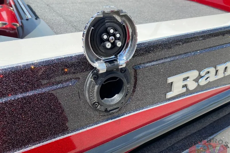 Slide: The Image of 2020 Ranger Z520L boat with open electrical socket on glittery red and black exterior. - 68