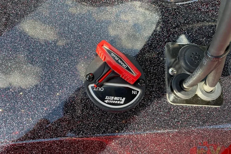 Slide: The Image of 2020 Ranger Z520L boat control panel with Flow-Rite valve and power plug. - 69