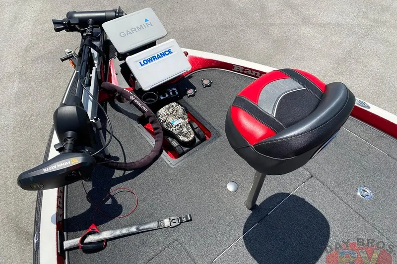 Slide: The Image of 2020 Ranger Z520L boat deck with Garmin and Lowrance electronics, red and black seat. - 70