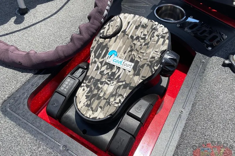 Slide: The Image of Foot pedal control on 2020 Ranger Z520L boat with camouflage design and cup holder. - 75