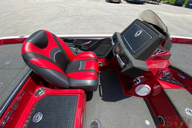 Slide: The Image of 2020 Ranger Z520L boat interior with red and black seat and modern dashboard. - 86