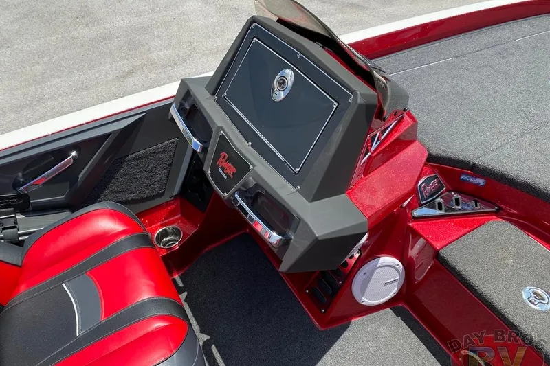 Slide: The Image of 2020 Ranger Z520L boat dashboard with red and black seating, featuring modern controls. - 87
