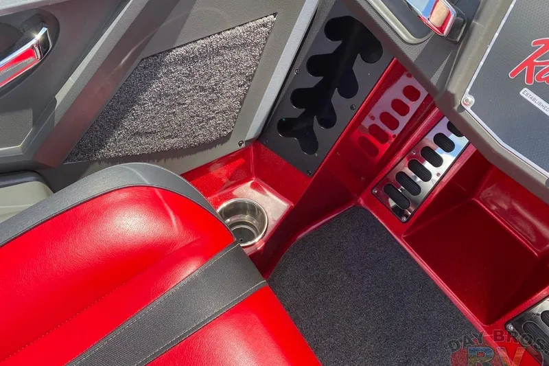 Slide: The Image of Interior of 2020 Ranger Z520L boat with red and black seating, cup holder, and storage compartments. - 88