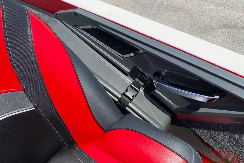Slide: The Image of 2020 Ranger Z520L boat interior with red and black seating, sleek design details. - 90