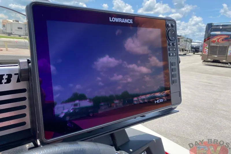 Slide: The Image of Lowrance HDS-12 display on 2020 Ranger Z520L boat, with RVs in the background. - 96