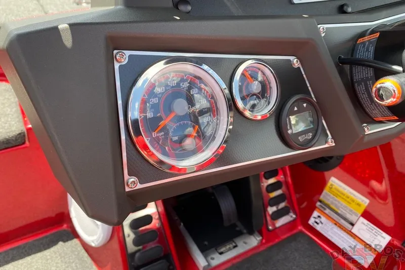 Slide: The Image of Dashboard of a 2020 Ranger Z520L boat with speedometer and fuel gauge. - 97