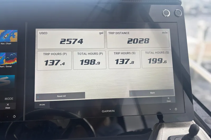 Slide: The Image of Garmin display on 2024 Regal 36 XO showing fuel usage and trip data. - 19