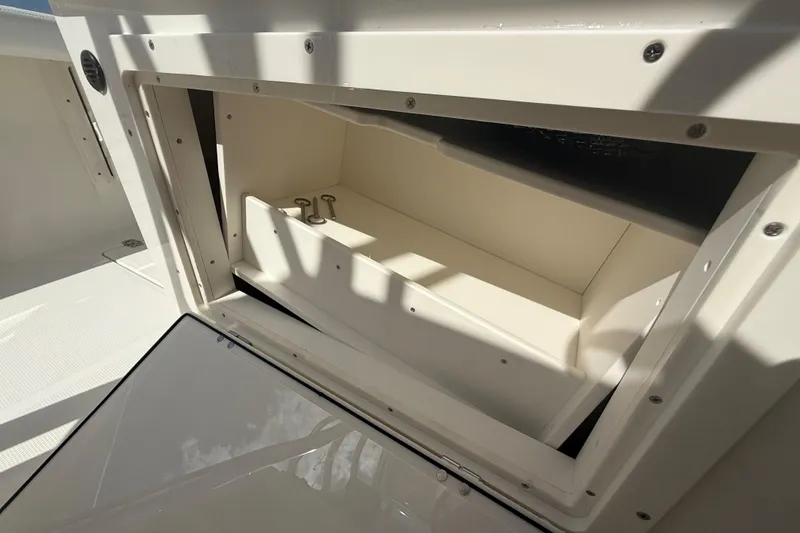 Slide: The Image of Open storage compartment on 2026 Pathfinder 2400 Open boat, showcasing interior space. - 40