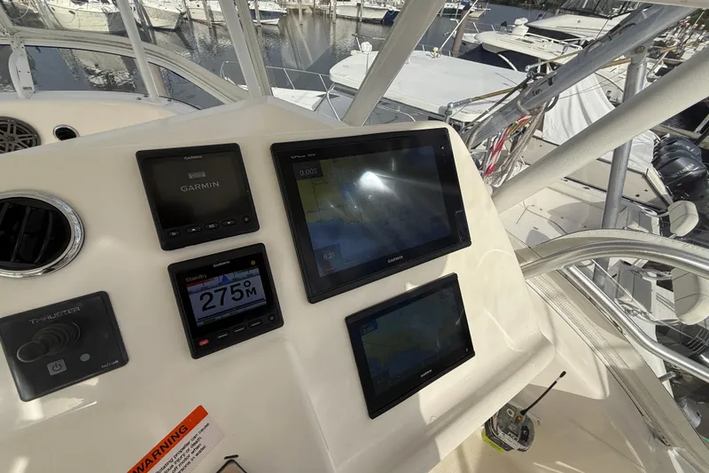 Slide: The Image of Control panel of 2005 Riviera 40 Flybridge with Garmin navigation displays. - 30