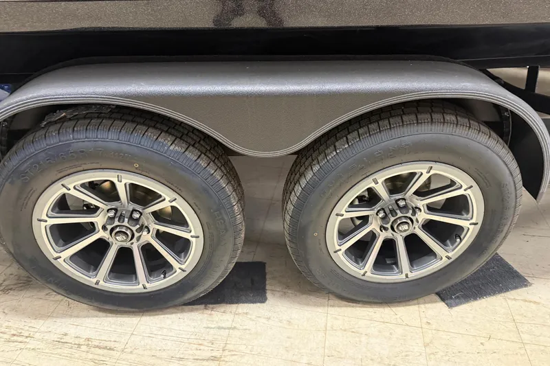 Slide: The Image of 2026 Skeeter WX1910 trailer wheels with dual tires and sleek alloy rims. - 20