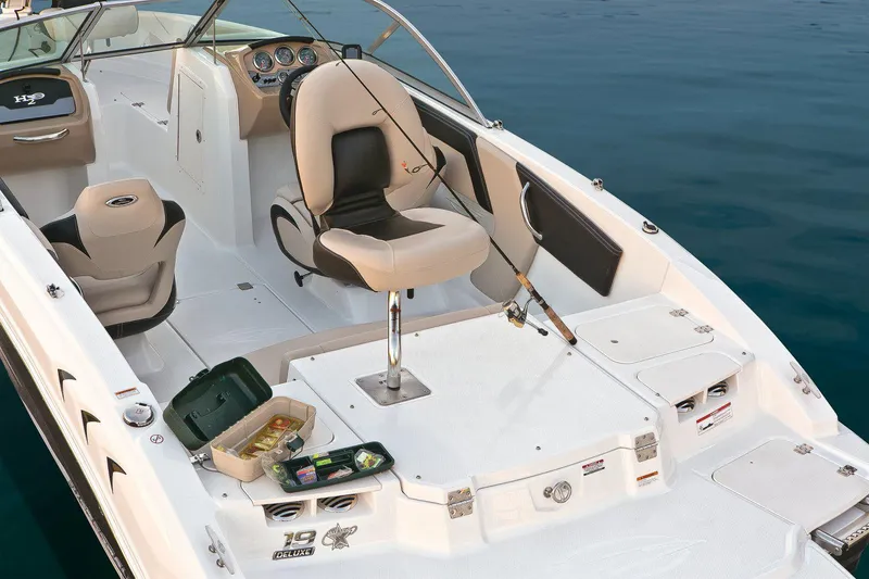 Slide: The Image of Manufacturer Provided Image: 2018 Chaparral 19 H2O Ski & Fish boat interior with fishing gear. - 18