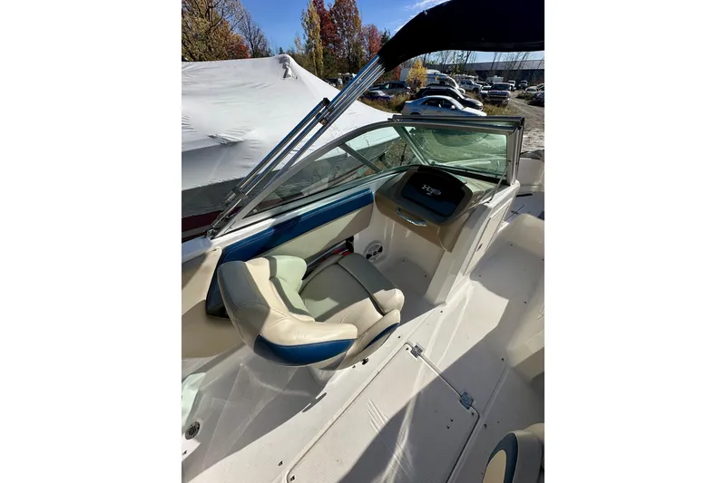 Slide: The Image of 2018 Chaparral 19 H2O Ski & Fish boat interior with seating and dashboard. - 8