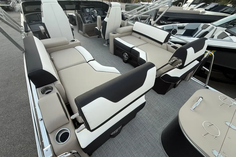 Slide: The Image of 2026 Tahoe Pontoon Cascade Quad Lounger interior with luxurious seating and modern design. - 7