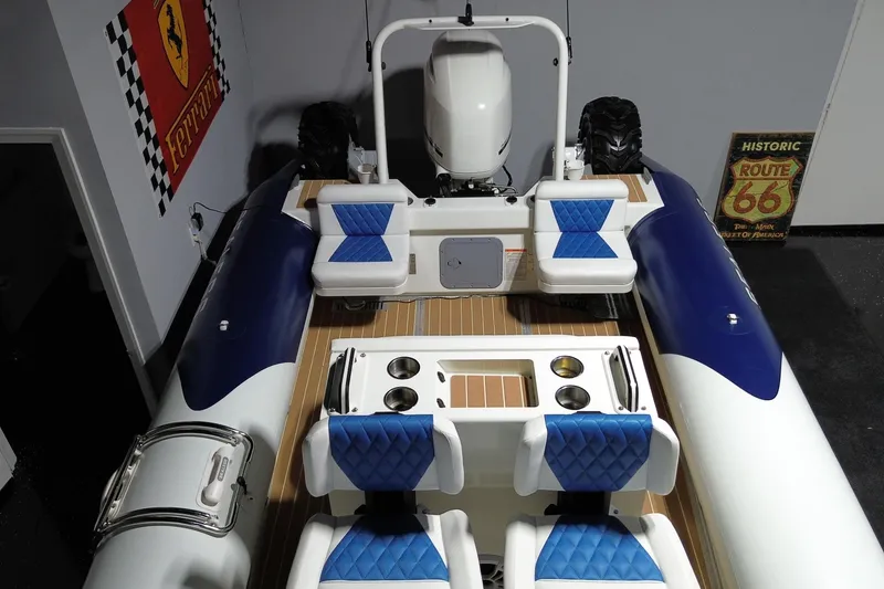 Slide: The Image of 2021 Sealegs 7.5M RIB with blue seating, Route 66 and Ferrari signs. - 23