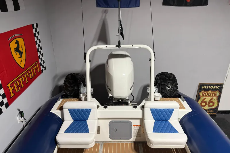 Slide: The Image of 2021 Sealegs 7.5M RIB with blue seating, Ferrari and Route 66 decor. - 25
