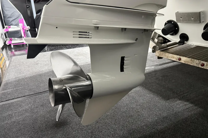 Slide: The Image of 2021 Sealegs 7.5M RIB outboard motor propeller in a garage setting. - 33