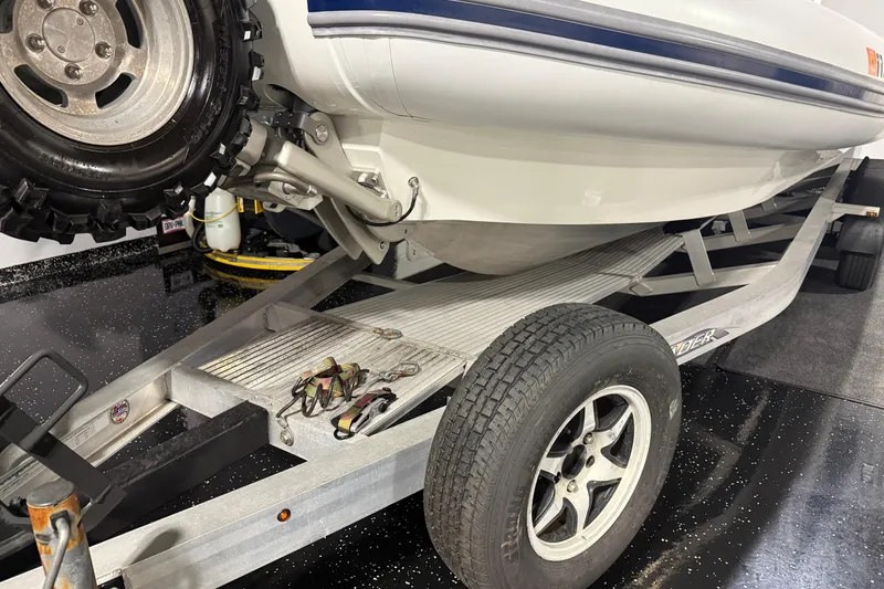 Slide: The Image of Sealegs 7.5M RIB 2021 on trailer, showcasing wheels and hull details. - 40