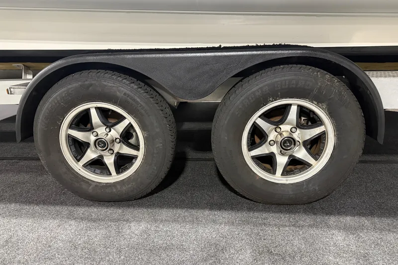 Slide: The Image of Trailer wheels of a 2021 Sealegs 7.5M RIB, featuring dual tires and alloy rims. - 41