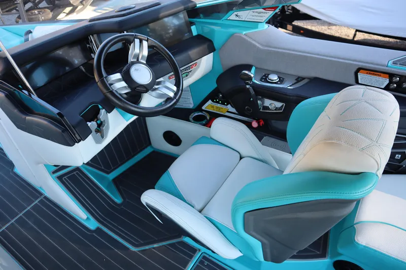 Slide: The Image of 2021 Nautique Super Air Nautique G23 Paragon cockpit with modern steering and controls. - 15