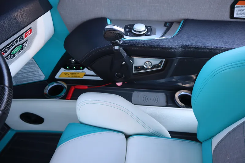 Slide: The Image of Interior of 2021 Nautique Super Air Nautique G23 Paragon with modern controls and seating. - 16