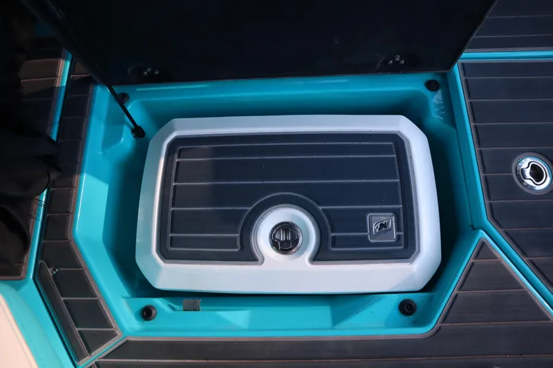 Slide: The Image of Storage compartment of 2021 Nautique Super Air Nautique G23 Paragon boat. - 28