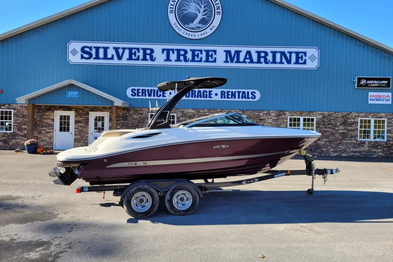 The Image of 2013 Sea Ray 210 SLX boat on trailer at Silver Tree Marine. - 0