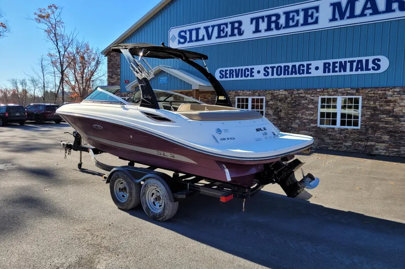 Slide: The Image of 2013 Sea Ray 210 SLX boat on trailer at Silver Tree Marine. - 5