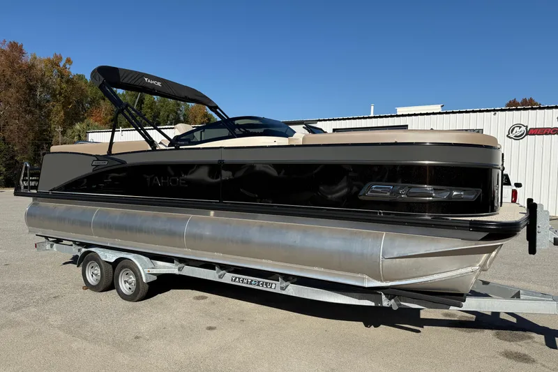 The Image of 2026 Tahoe Pontoon Cascade Quad Lounger Windshield on trailer, parked outdoors. - 0