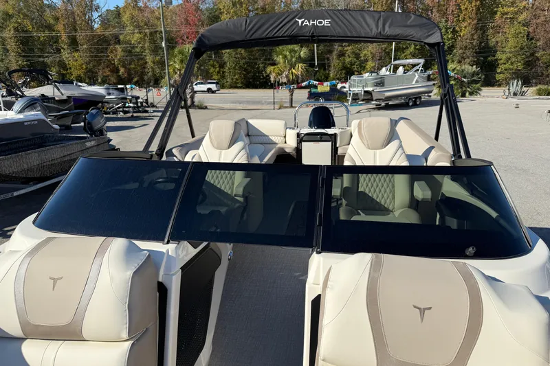 Slide: The Image of 2026 Tahoe Pontoon Cascade Quad Lounger Windshield with luxurious seating and sleek design. - 2