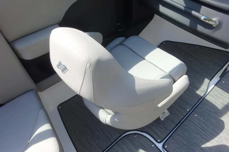 Slide: The Image of 2022 Four Winns H4 OB boat interior with sleek, modern seating and stylish flooring. - 11