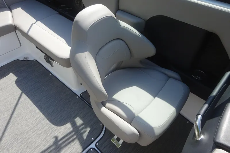 Slide: The Image of 2022 Four Winns H4 OB boat interior with gray seating and flooring. - 12