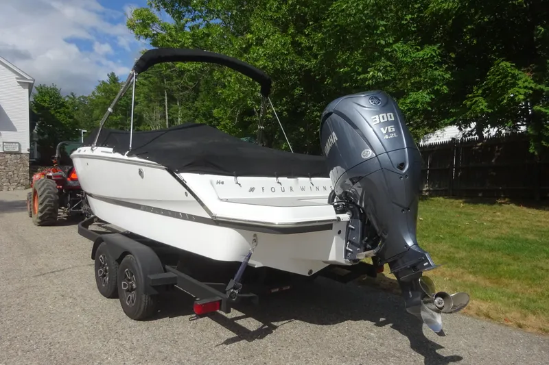 Slide: The Image of 2022 Four Winns H4 OB boat with Yamaha 300 V6 engine on trailer. - 3