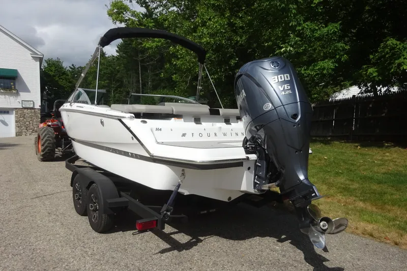 Slide: The Image of 2022 Four Winns H4 OB boat with Yamaha 300 V6 engine on trailer. - 6