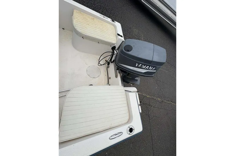 Slide: The Image of 2006 Key West 1720 Dual Console boat with Yamaha outboard motor, rear seating view. - 16